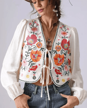 Broderad blus med blommor