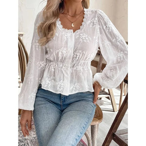 Vit broderad blus i broderie anglaise med ballongärm