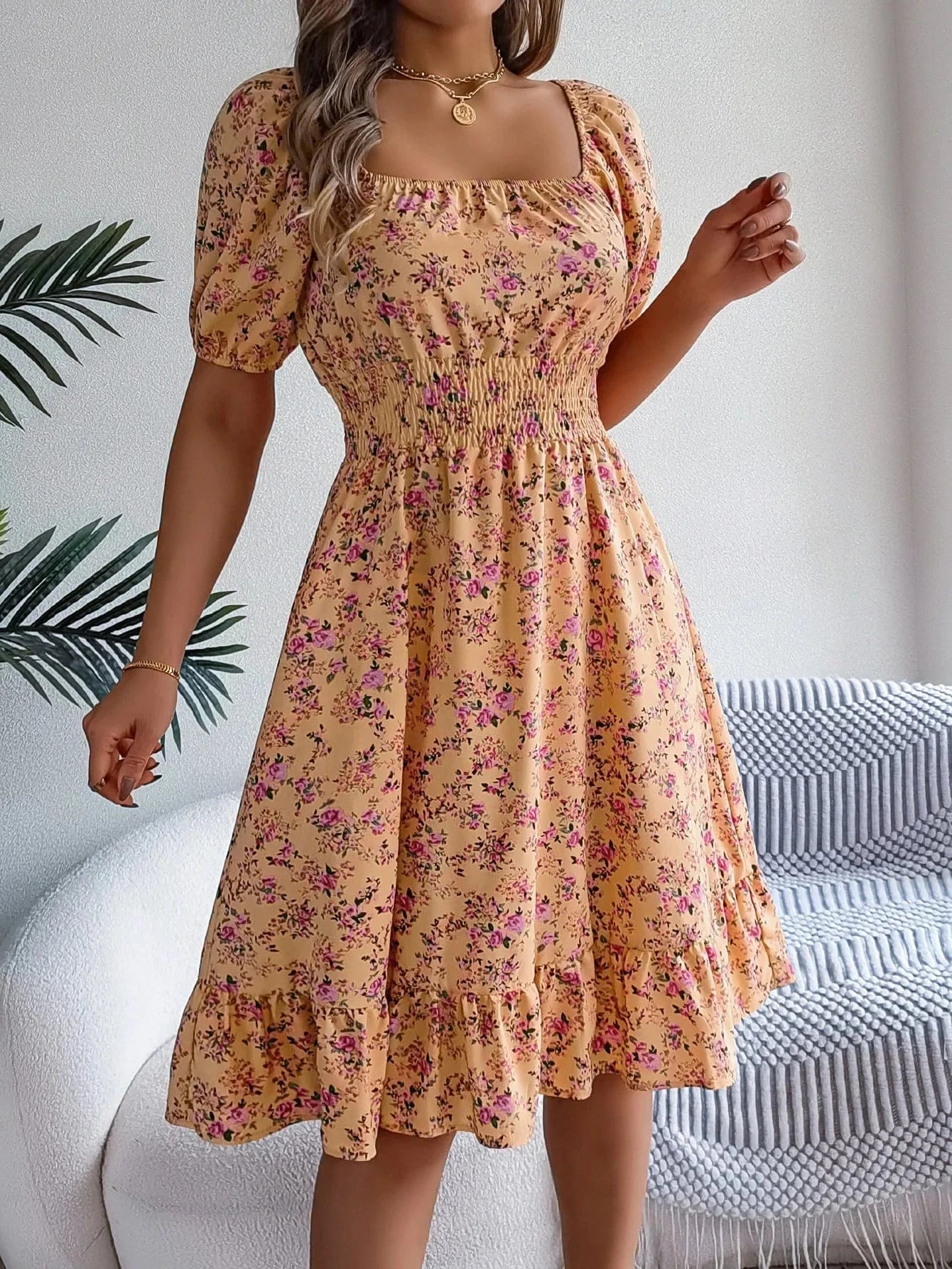 Blommig off-shoulder midiklänning