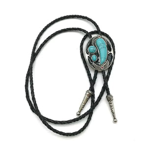 Bolo tie i svart läder med ovalt hänge och natursten