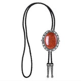 Bolo tie med brunt ovalt hänge i natursten Brun