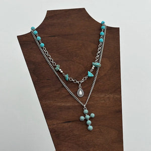 Flerradigt halsbandsset i western stil med turkoskors och choker