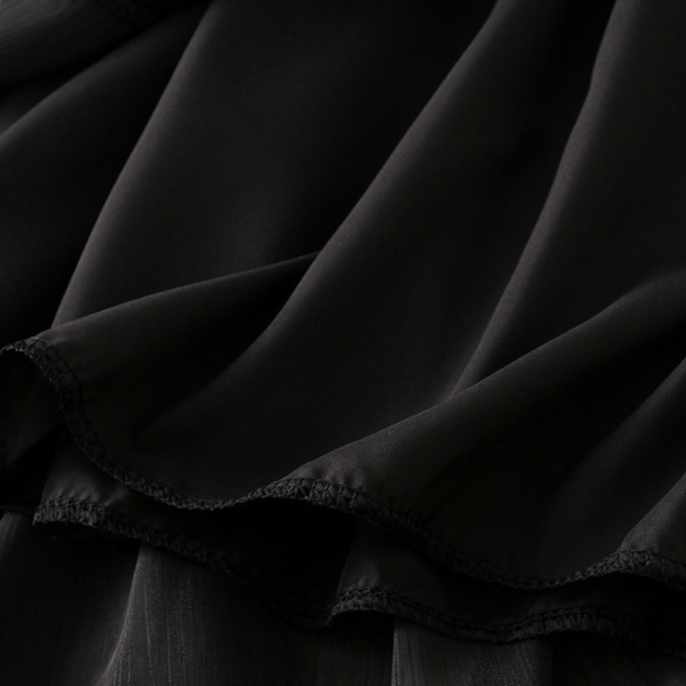 Midikjol med asymmetrisk drapering