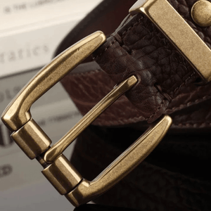 Westernbälte i äkta läder med spänne i borstad mässing